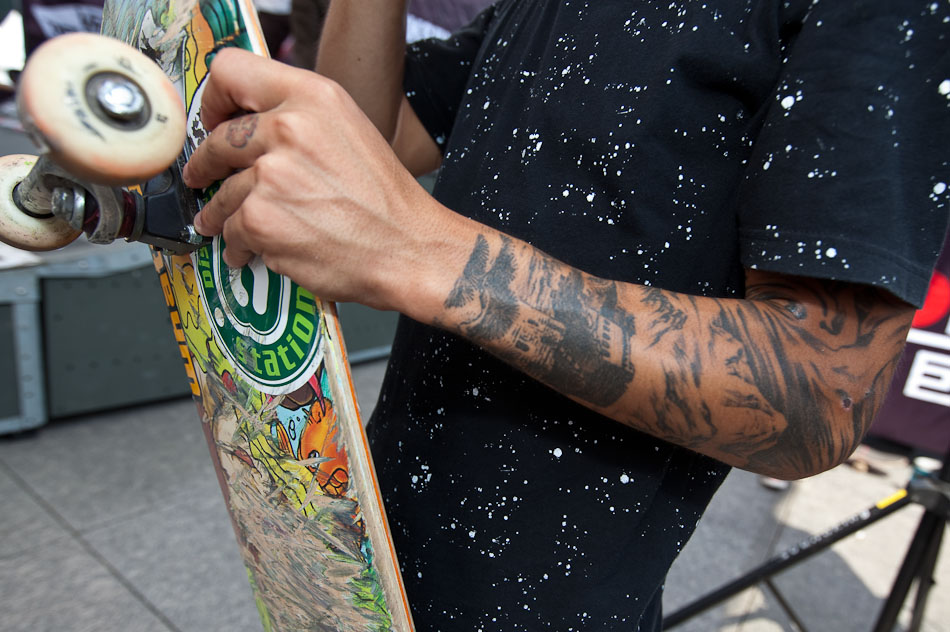 A Baby Dragon Skateboarding National Finals contender sports a Great Wall tattoo