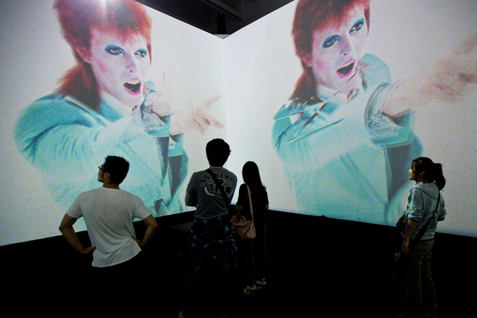 Mick Rock and Barney Clay collaborate on a new David Bowie video for The Creators Project Beijing event.