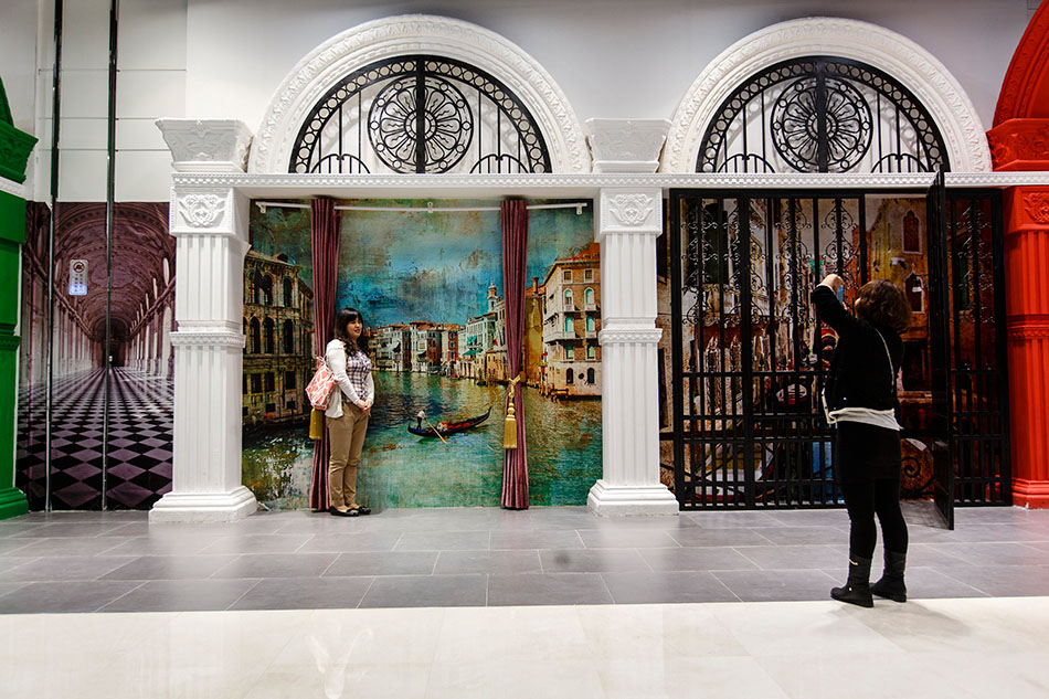 The Lotte department store in the New Century Global Center contains dioramas and wall paintings for customers to pose with while shopping.