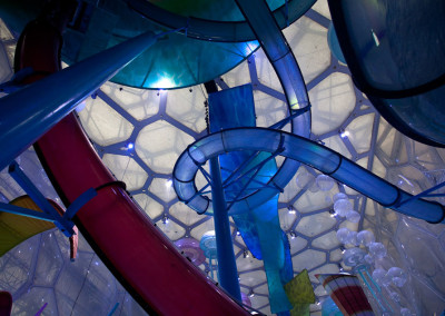 Tubes wind around the ceiling at the massive Happy Water Park constructed within Beijing's Olympic Water Cube.
