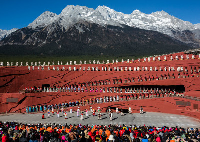 Ethnic minority actors perform at the Lijiang Impressions show below Jade Dragon Snow Mountain. - Lijiang, Yunnan